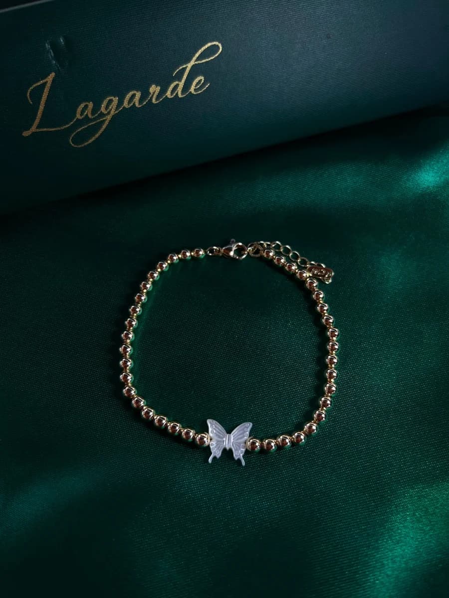 Pulsera Cadena de Bolitas con Mariposa en Chapa de Oro 18k — vista 3