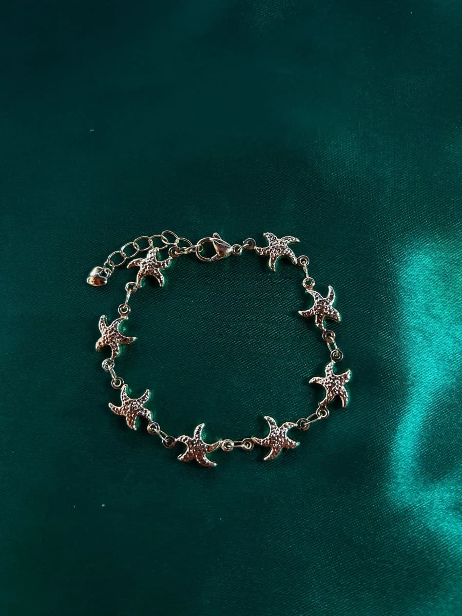 Pulsera Encanto Estrella de Mar Delicada en Chapa de Oro 18k — vista 2