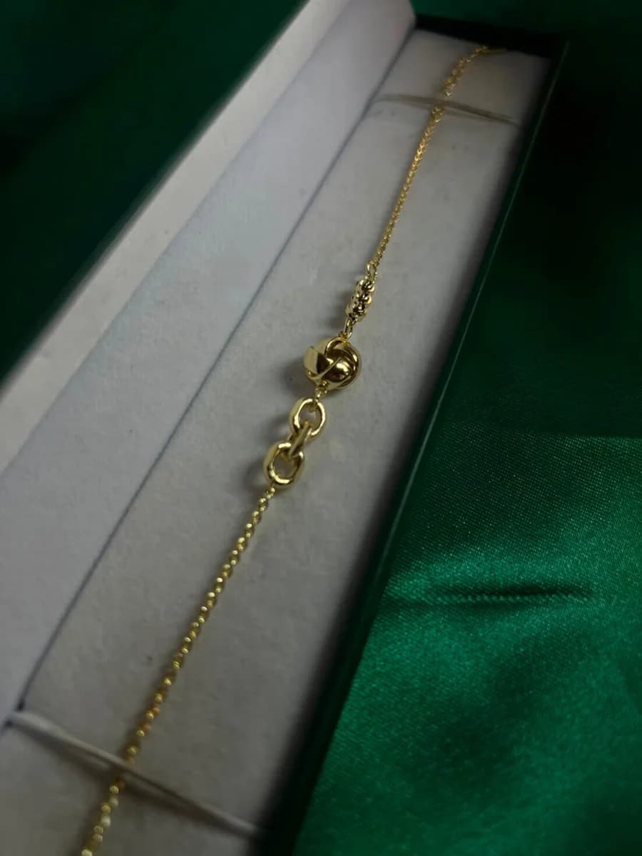 Pulsera Bola Torcida en Chapa de Oro 18k