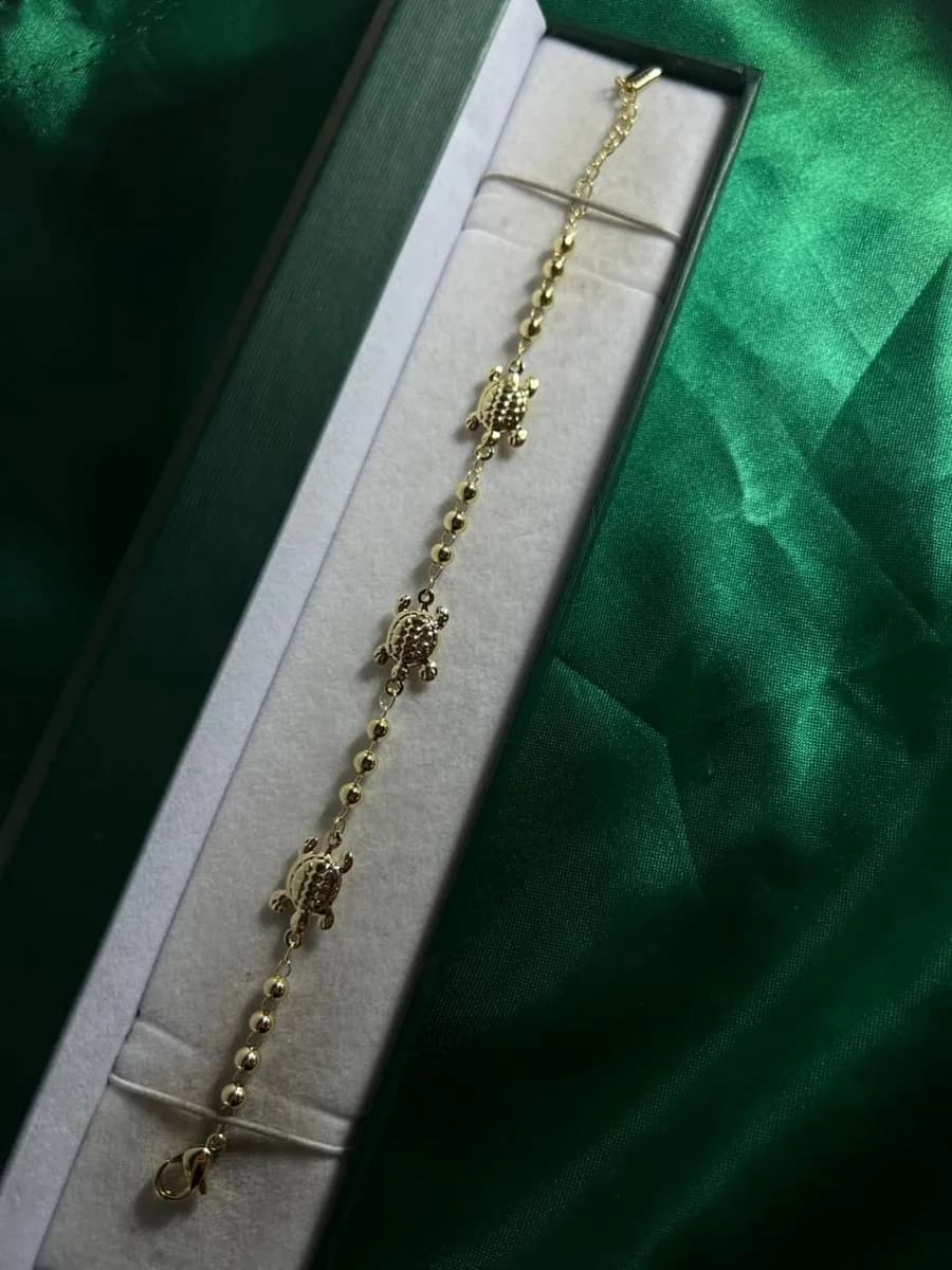 Pulsera Tortugas con Bolitas en Chapa de Oro 18k